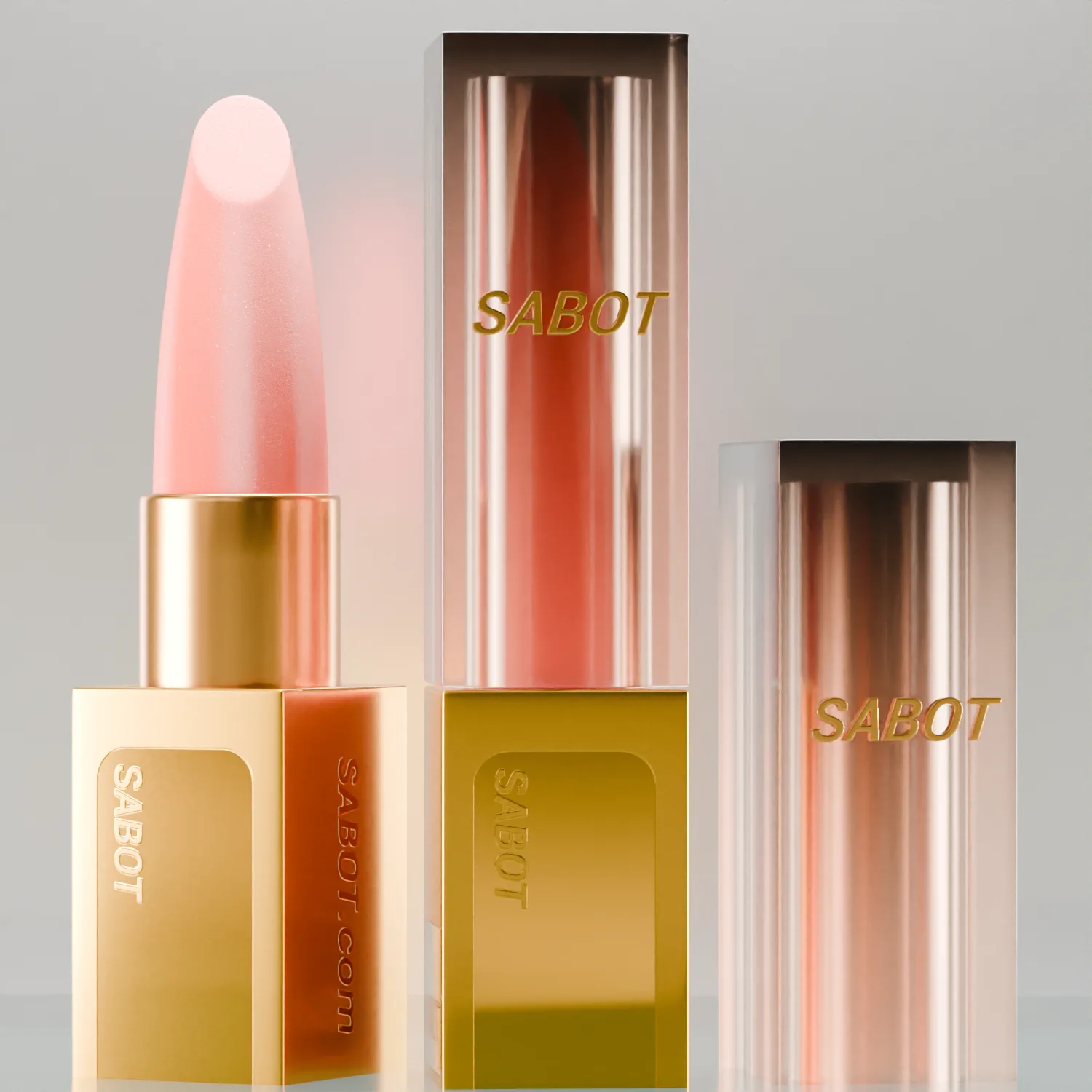 Three SABOT lipsticks, golden packaging